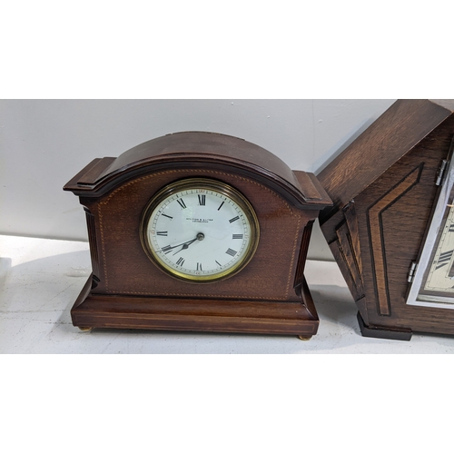 27 - Three mantel clocks to include an Edwardian arched top clock, the dial signed Wilson & Sharp 7.5cm h... 