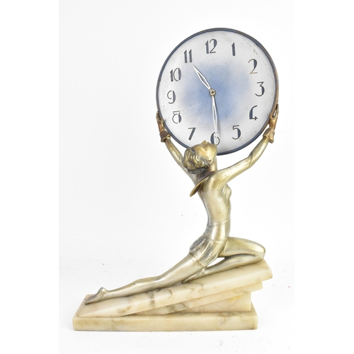 An Art Deco figural mantel clock, in the manner of Johann Ferdinand ...
