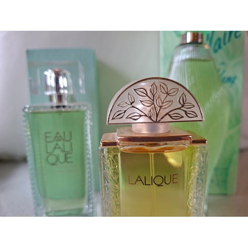 21 - Lalique- Three fragrances comprising a bottle of Claire de Nilang Eau de Toilette 100ml having a twi... 