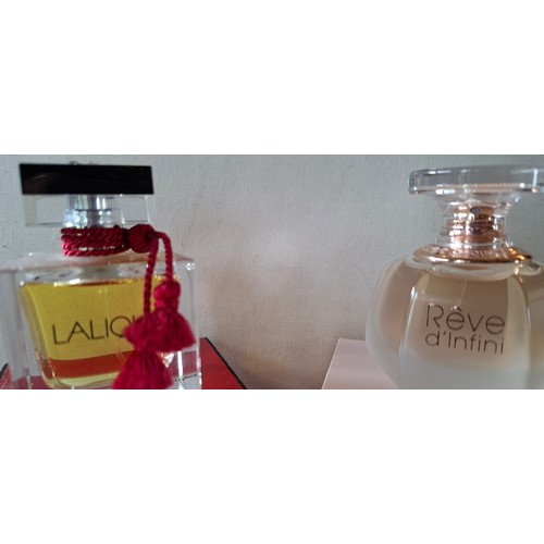 23 - Lalique- Two fragrances comprising a bottle of Reve d'Infini Eau de Parfum 50ml with box and a bottl... 