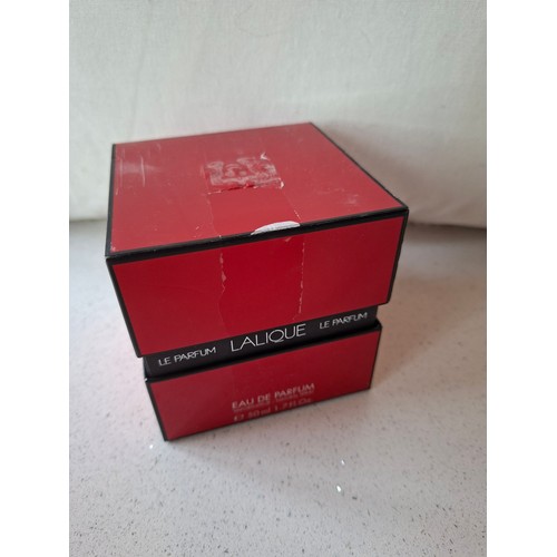 23 - Lalique- Two fragrances comprising a bottle of Reve d'Infini Eau de Parfum 50ml with box and a bottl... 