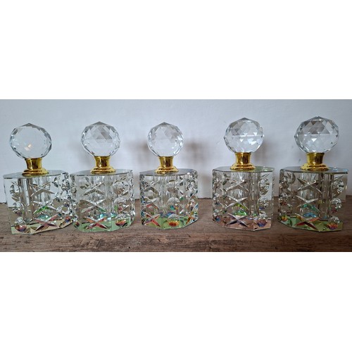 53 - A collection of glass scent bottles to include a large Paco Rabanne Calandre fatice bottle 34cm high... 
