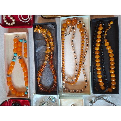 50 - A quantity of vintage costume jewellery to include a 3-strand  and two 2-strand Aurora Borealis neck... 