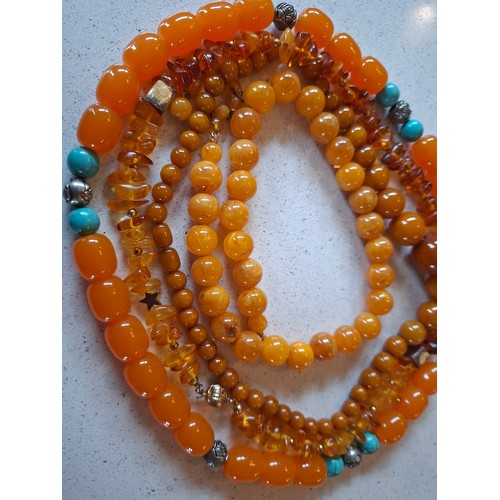 50 - A quantity of vintage costume jewellery to include a 3-strand  and two 2-strand Aurora Borealis neck... 