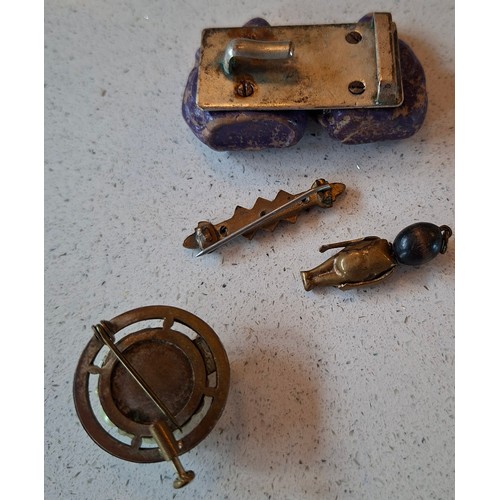 56 - A quantity of costume jewellery to include Victorian brooches, a Trifari gold tone leaf bracelet, la... 