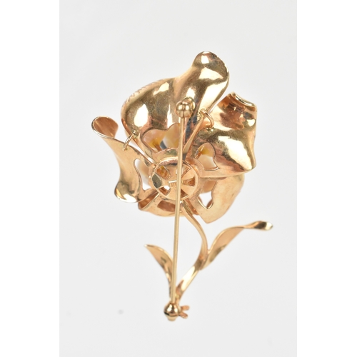 58 - A 14ct gold pearl floral brooch, modelled as a stylised flower set with six round pearls to a textur... 