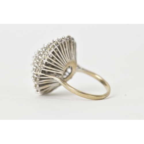 60 - An 18ct white gold diamond cluster ring, the circular head set with a central diamond measuring appr... 