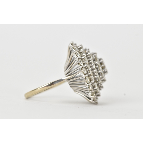 60 - An 18ct white gold diamond cluster ring, the circular head set with a central diamond measuring appr... 