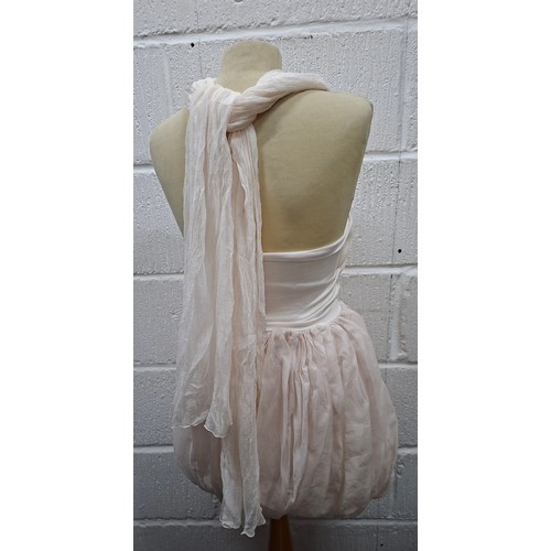 39 - Dolce & Gabbana- A pale pink baby dolly dress with long trailing tie to the back, European size 40 a... 