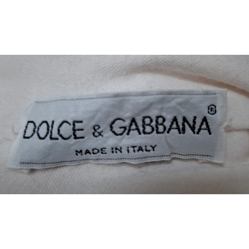 39 - Dolce & Gabbana- A pale pink baby dolly dress with long trailing tie to the back, European size 40 a... 