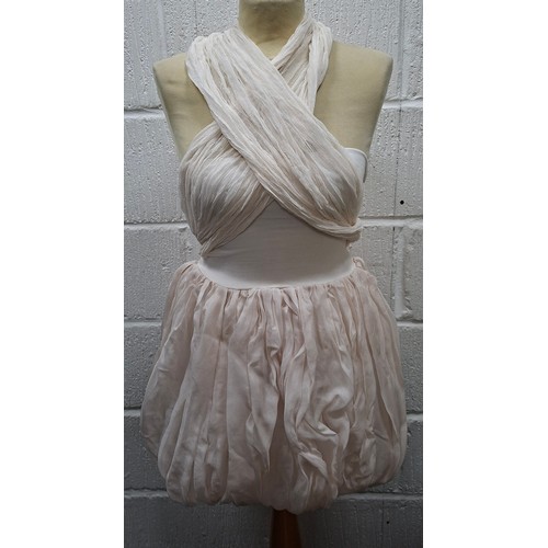 39 - Dolce & Gabbana- A pale pink baby dolly dress with long trailing tie to the back, European size 40 a... 