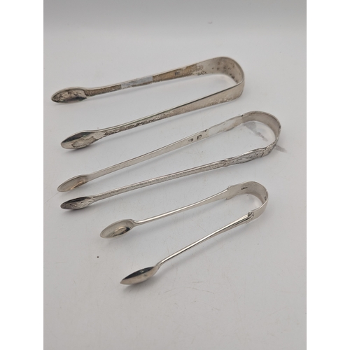 32 - Three pairs of sugar tongs, one pair having engraved decoration, total weight 80.6g
Location:P7
If t... 