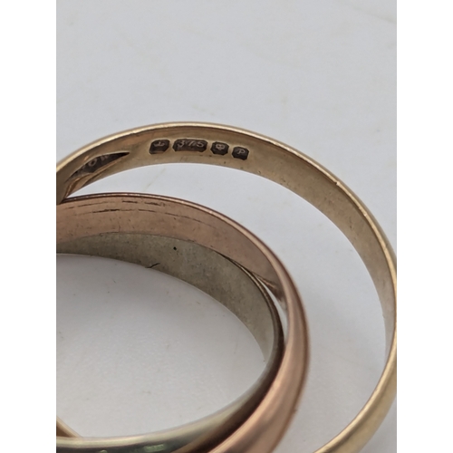 7 - A 9ct gold tri coloured interlinked Russian weeding band, size J, weight 3.6g
Location:RING
If there... 