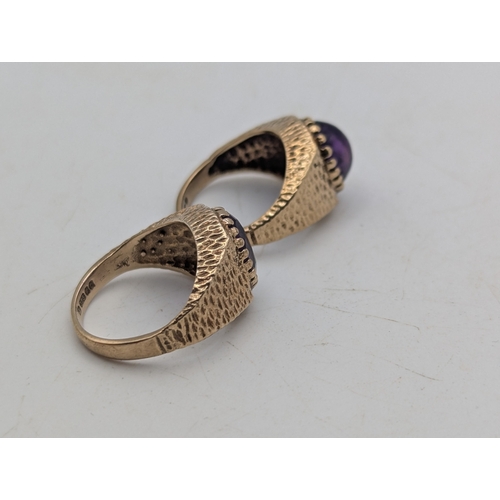 9 - Two 9ct yellow gold and amethyst signet rings, one set with a faceted oval cut amethyst and the othe... 