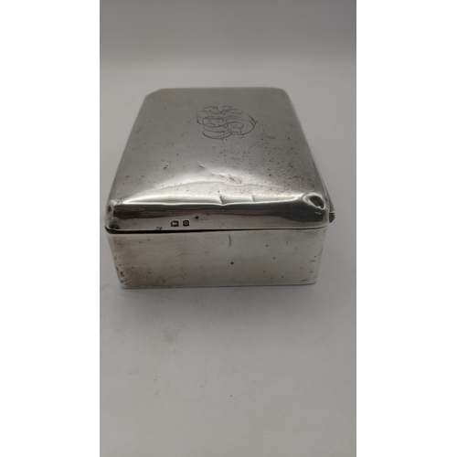 60 - A silver cigarette box with plywood interior, hallmarked Birmingham 1938
Location:A4M
If there is no... 