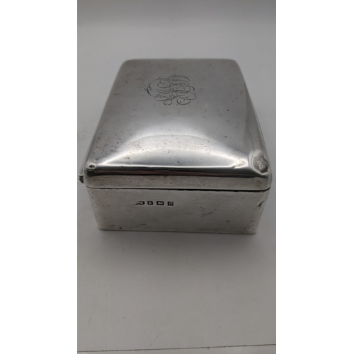 60 - A silver cigarette box with plywood interior, hallmarked Birmingham 1938
Location:A4M
If there is no... 