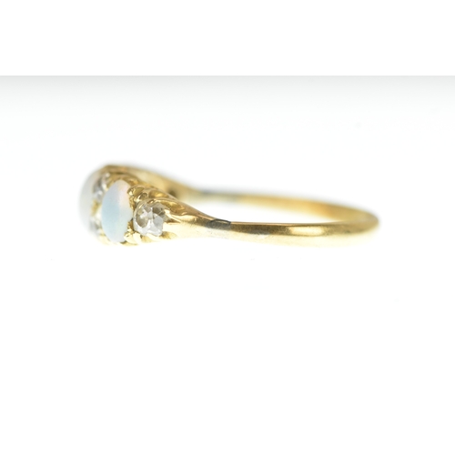 1 - A Victorian diamond and opal 18ct yellow gold ring, set with three graduated oval cabochon-cut opals... 
