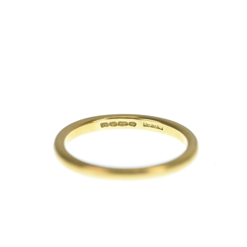 10 - A 22ct yellow gold wedding band, stamped 22 with British hallmarks, size N1/2, 3.8 grams. 
If there ... 