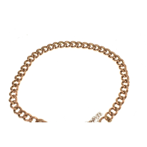 14 - A 9ct rose gold curb link bracelet with a rose coloured padlock charm having a 9ct yellow gold sprin... 