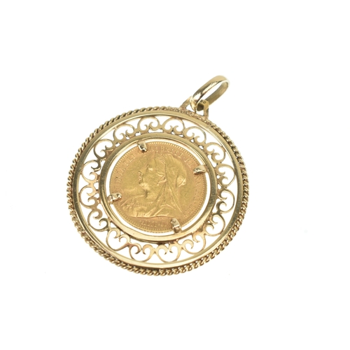 19 - A Victorian half sovereign, London mint dated 1900, mounted in a 9ct yellow gold c-scroll pierced fr... 