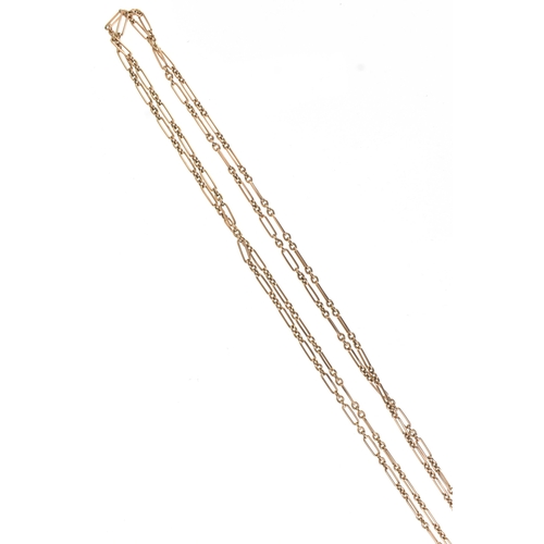 21 - A 9ct rose gold trombone link opera length chain, with bulldog clasp, stamped, 74cml, 34.4g
Location... 