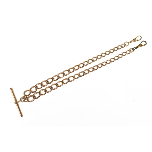 22 - A 9ct rose gold curb link pocket watch chain, with a 9ct rose gold T-bar, a rose coloured metal bull... 