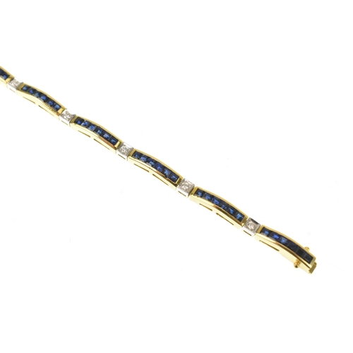 25 - A diamond and blue sapphire 18ct yellow gold tennis bracelet, featuring channel set square-cut blue ... 