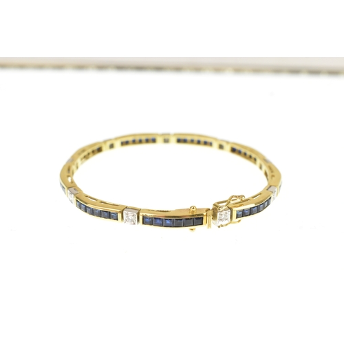 25 - A diamond and blue sapphire 18ct yellow gold tennis bracelet, featuring channel set square-cut blue ... 