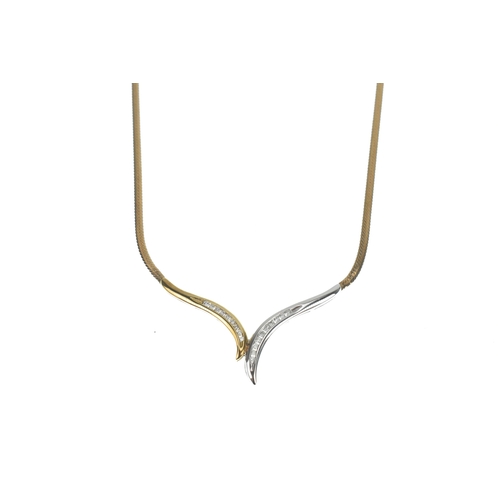 29 - A 9ct yellow and white gold V shaped herringbone choker necklace, with 19 small channel set brillian... 