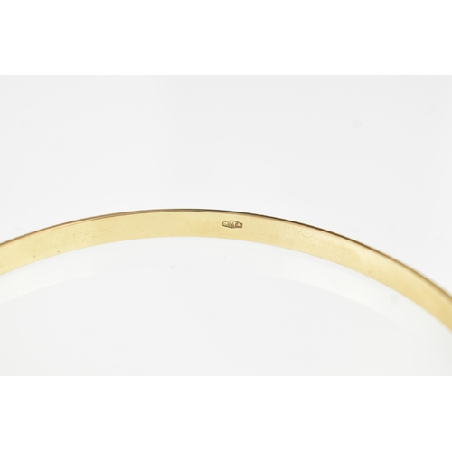 3 - A 9ct yellow gold bangle, stamped 375, 6.7cm in diameter, 13.9 grams.
If there is no condition repor... 