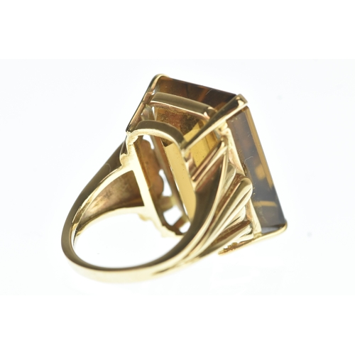 30 - A large emerald cut citrine and yellow metal dress ring, stone measurements 22.5mm x 16.3mm x 10.9mm... 