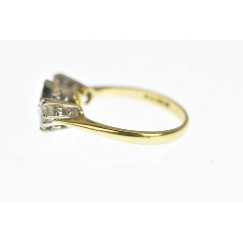 33 - A blue sapphire and diamond 18ct yellow a white gold engagement ring, with central oval cut blue sap... 