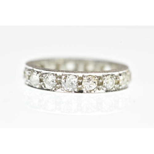 37 - A diamond and 18ct white gold full eternity ring, set with 15 old cut claw set diamonds, approx diam... 