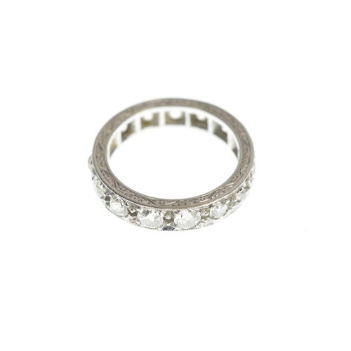 37 - A diamond and 18ct white gold full eternity ring, set with 15 old cut claw set diamonds, approx diam... 