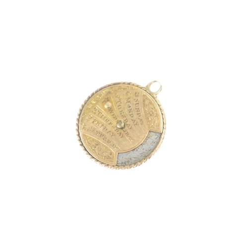 42 - A Victorian gold and silver perpetual calendar pendant/ fob, engraved 'perpetual calendar' and sun '... 