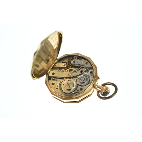 48 - An early 20th century 14ct gold ladies fob watch, having an engine turned case with a vacant shield ... 
