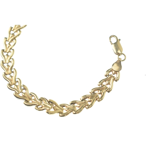 50 - A 9ct gold bracelet, formed as a series of articulated links to a lobster claw clasp, stamped 375, 1... 