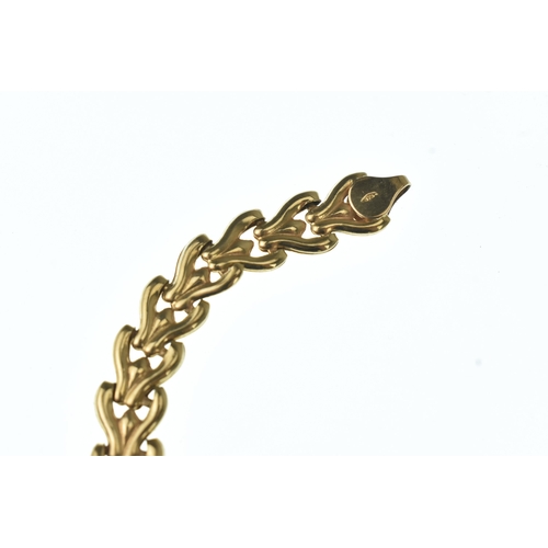 50 - A 9ct gold bracelet, formed as a series of articulated links to a lobster claw clasp, stamped 375, 1... 