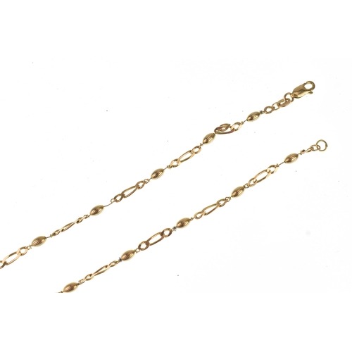 51 - A 9ct gold necklace, formed with alternating curb links and oval links, to a lobster claw clasp, 55c... 