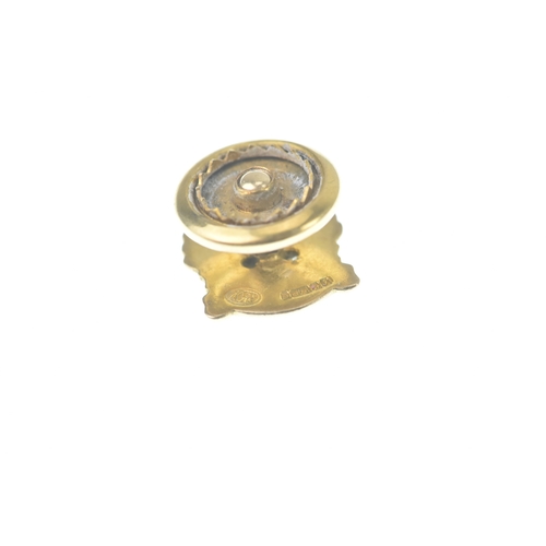 56 - A Shell 30 Year Service tie tack pin, in the form of a shell and inset with two brilliant cut diamon... 