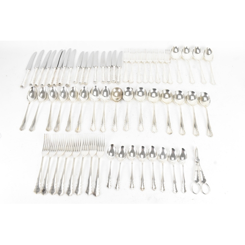 An Elizabeth II silver collection of cutlery, by Harrods Ltd, hallmarked Sheffield 1973, consisting of eight table knives, eight side knives, eight table forks, eight side forks, eight side spoons, eight soup spoons, eight tea spoons, four table spoons and a pair of grape scissors, weight excluding knives 3019.8 grams 
If there is no condition report shown, please request