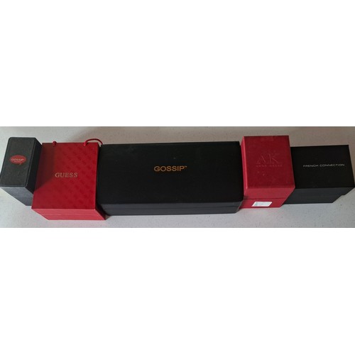 29 - Ladies boxed fashion watches to include a Gossip watch set with 10 interchangeable straps, a purple ... 