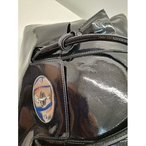 9 - Mulberry- A black patent leather 'Bayswater Heritage' handbag having silver tone hardware, internal ... 