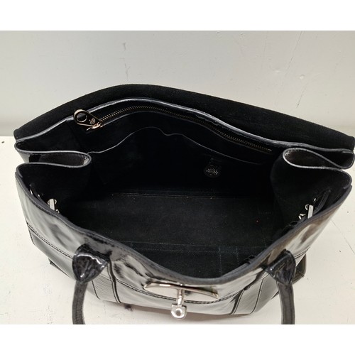 9 - Mulberry- A black patent leather 'Bayswater Heritage' handbag having silver tone hardware, internal ... 