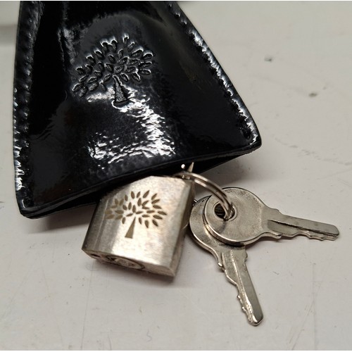 9 - Mulberry- A black patent leather 'Bayswater Heritage' handbag having silver tone hardware, internal ... 