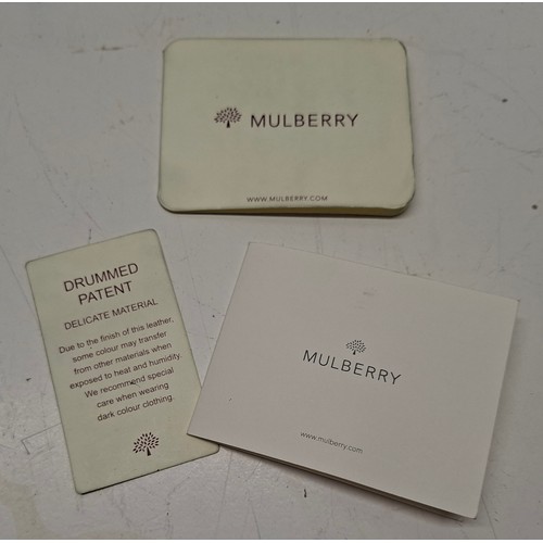 9 - Mulberry- A black patent leather 'Bayswater Heritage' handbag having silver tone hardware, internal ... 