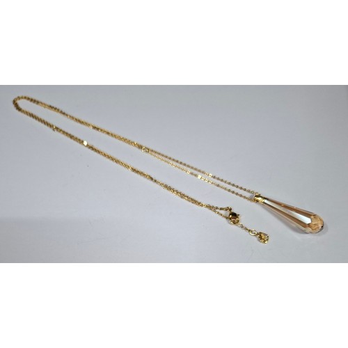 54 - A quantity of jewellery to include a Swarovski necklace having a coloured crystal pendant and brande... 