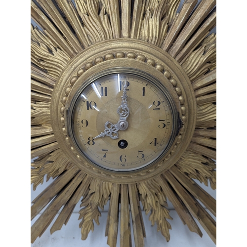 1 - An early 20th century Japy Freres and Cie sunburst wall hanging clock
Location:RWF
If there is no co... 