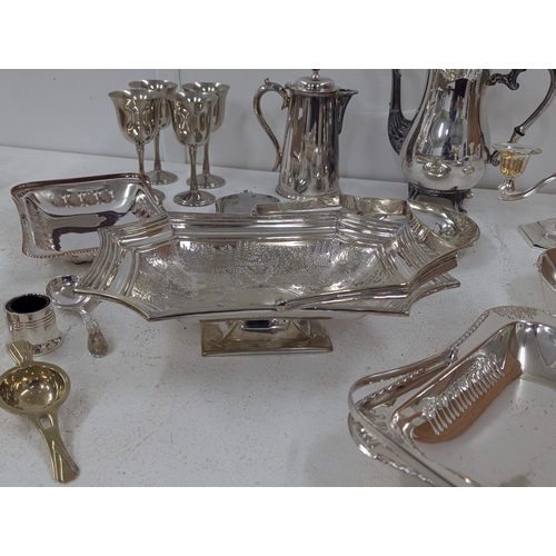 11 - A mixed group of silver plated items to include a pedestal basket with swing handle, goblets and oth... 