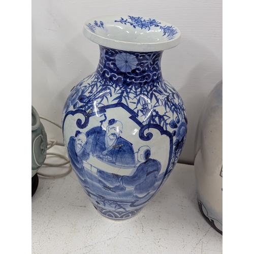 12 - A mixed lot to include a Chinese style table lamp, a Japanese blue and white vase, together with Art... 